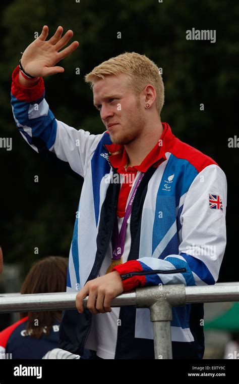 Britishl Parlympic Gold Medal Winning Jonnie Peacock Waves During The