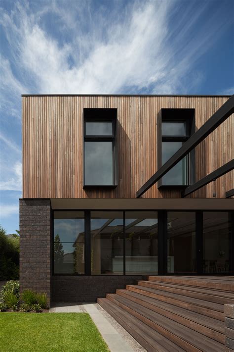 A problem with timber cladding. brown brick ground with timber upstairs | Facade house ...