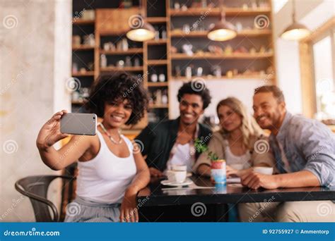 Multiracial Friends Taking Selfie On Smart Phone At Cafe Stock Image Image Of Culture Hand