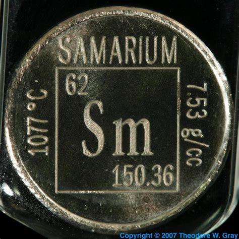 Element coin, a sample of the element Samarium in the ...