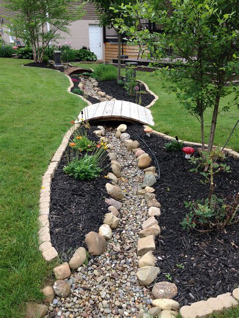 Dry Creek Bed With Two Bridges Landscaping With Rocks Rock Garden