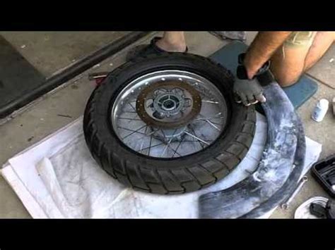 Get your bike shop to replace the spoke or to cut the existing spoke to the right length and replace the rim tape. Fixing a flat motorcycle tire - tubed - YouTube