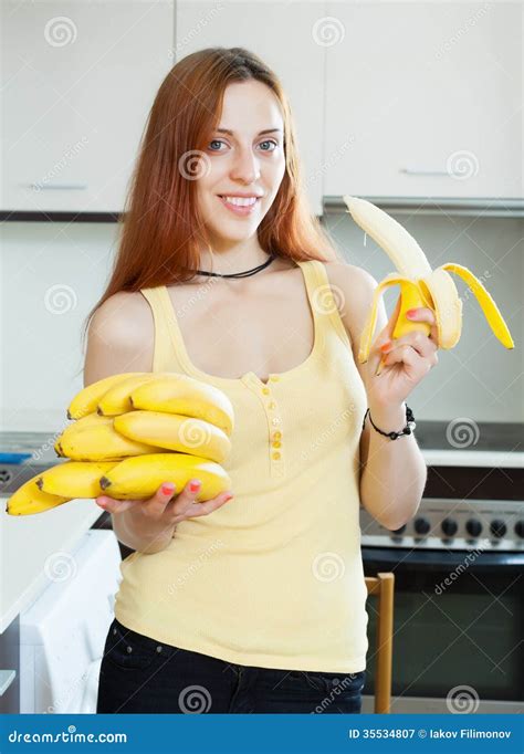Young Woman With Bananas In Kitchen Stock Image Image Of Lady Smile