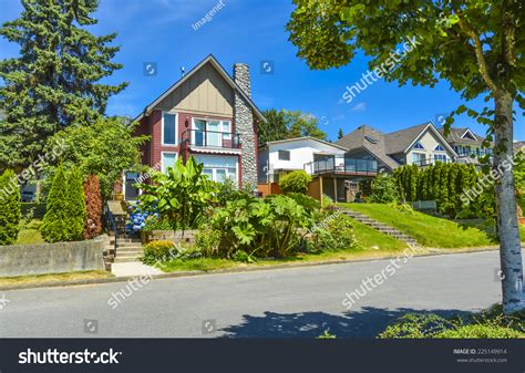 Beautiful Suburban House Over Street Landscaped Stock Photo 225149914