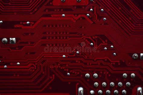 Red Computer Motherboard Chips Close Up With Contacts Stock Photo