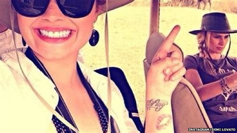 Demi Lovato Covers Up Vagina Kiss Tattoo With Rose Design Bbc News