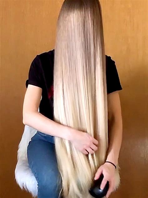 video very healthy long blonde hair in front of her realrapunzels