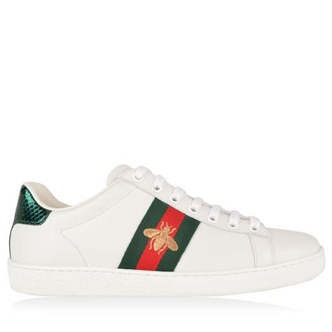 White leather with red leather detail on the heel of one shoe and green on the other. Gucci | New Ace Bee Embroidered Trainers | Women's ...