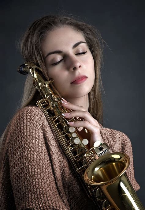 Woman Holding Brass Colored Saxophone Girl Music Saxophone Instrument Playing Brunette