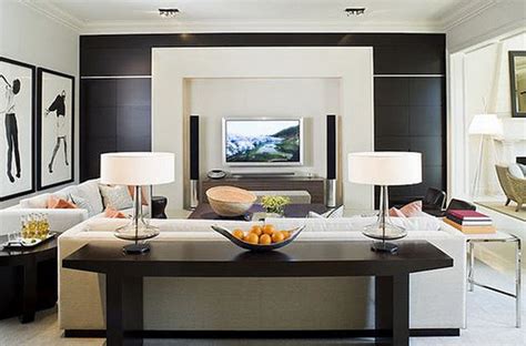 And yes, you can totally use lamps around your television as long as you keep them to the sides of the screen (and keep them off while the tv is in use to prevent glare). Comfortable-Stylish-Living-Room-Designs-with-TV-Ideas_15 ...
