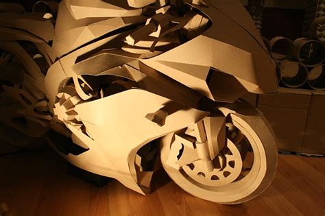 Quite often you can find such an option when the motor of a motorcycle bike is a motor from a chainsaw. papercraft - cardboard motorcycle on Behance