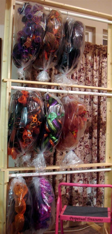 Wreath storage | Wreath storage, Holiday organization storage, Craft