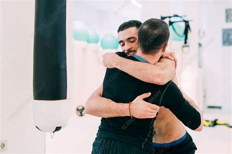 Male Friends Hugging Stock Image F0231254 Science Photo Library