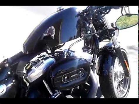 Everyone loves a mint condition sportster; Custom Harley 48 painted all black - YouTube