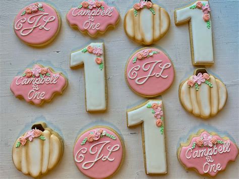 This frosting starts off softer on the cookies and then hardens up enough to stack them without being crunchy. Fall Birthday Floral Cookies | Fall birthday, Custom cookies, Cookie decorating