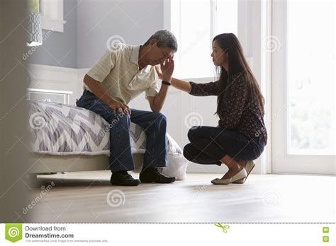 Adult Daughter Talking To Depressed Father At Home Stock Image Image Of Family Female