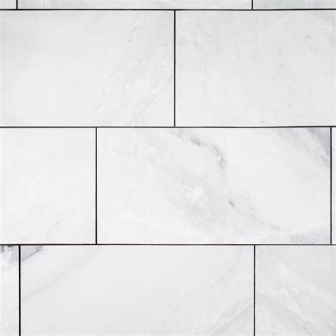 Apparently, he didn't seal the marble tiles before grouting. Mountain White Polished Marble Tile in 2020 | Polished marble tiles, Marble tile, White marble tiles