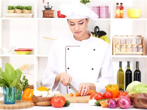 Young Woman Chef Cooking In Kitchen ⬇ Stock Photo Image By