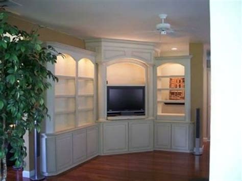 A tv stand or tv console is the most prominent piece of living room or media room furniture after the sofa set there! built in corner entertainment center | Built in Corner ...