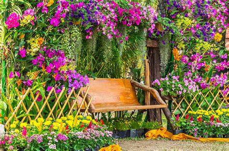 Beautiful flower garden arranged with red and white tulips and purple or blue flowers wooden fence with a flower garland. 45 Beautiful Fence Planters (Decorate Your Garden Fence ...