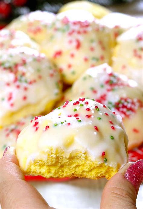Add the flour mixture in 2 additions and continue mixing just until moist clumps form. Lemon Italian Christmas Cookies - Another Simple Italian Lemon Cookie Recipe - She Loves ...