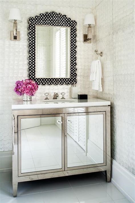 Each countersunk bathroom cabinet has a stainless steel surround frame. Metal Bath Vanity with Mirrored Cabinet Doors ...