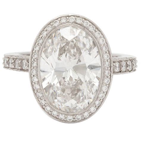 The diamonds come with varying standards in polish/symmetry which can range from ratings with good to excellent. Tiffany and Co. 4.78 Carat Custom Oval Diamond Platinum Ring at 1stdibs