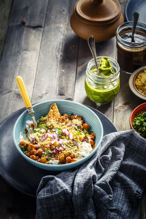 Dal makhani lentils in butter with fresh herbs and spices, garnished with fresh coriander. Samosa Chole Chaat | Chole Samosa Chaat | Indian Street ...