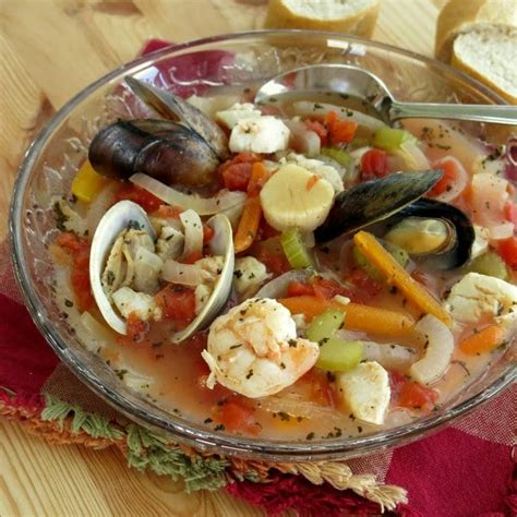 Shrimp, scallops, clams, mussels, and crab meat; Seafood Cioppino Stew - An Easy One-Pot Soup - The Dinner-Mom