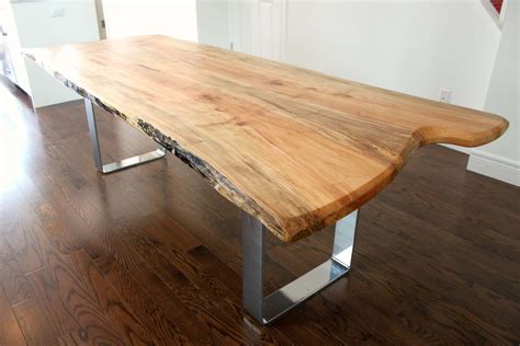 Modern live edge maple table with sleek chrome base