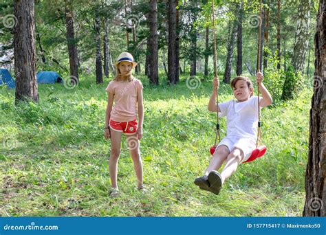Children Summer Camp Tourism Children On A Summer Vacation Swinging