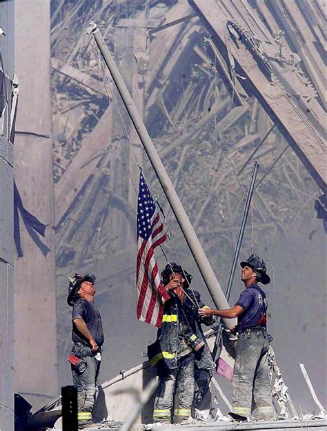 Firefighters Raising The American Flag At Ground Zero Pics