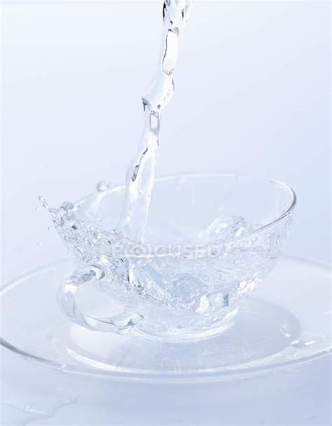 Pouring Water Into Glass Cup — Fresh White Stock Photo 150185716