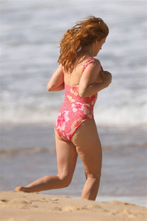 Isla Fisher Hits The Beach In Pink Swimsuit On The South Coast