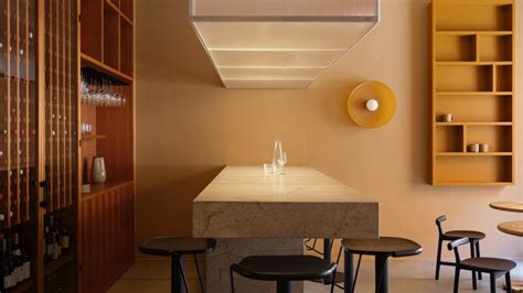 Note Design Studio Creates Warm Hued Wine Bar That Doubles As An Office