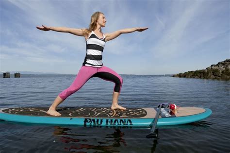the 8 best paddleboard yoga poses for all levels paddle board yoga yoga poses cool yoga poses