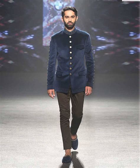 Gone are those days when wedding dresses for men were only limited to safari suits, kurtas or you can easily get this timeless piece customized from your designer in a print of your own choice and here's one simple wedding dress for men! Best Designer Groom Dresses for Indian Men, Indian Groom Wear