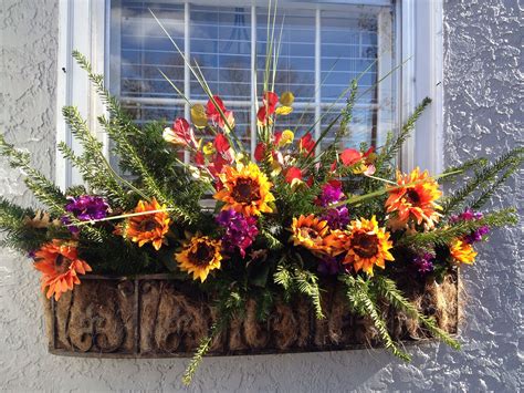 These are the most perfectly uncanny artificial flowers. Fall Window Box | Window box flowers, Fall window boxes ...