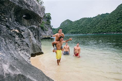 Group Of Four Friends Having Fun In An Exotic Tropical Beach By Stocksy Contributor Alejandro