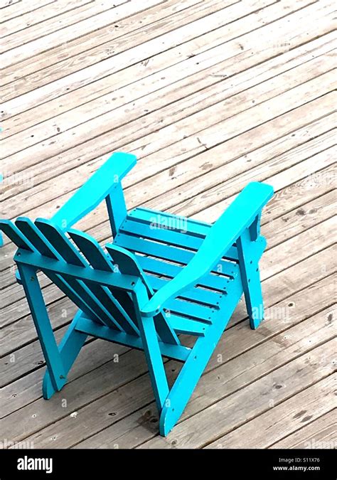 Blue Adirondack Chair On A Dock S11X76 