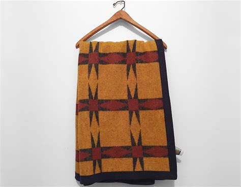 Geometric Wool Throw Blanket By Ourson In Goldenrod Rust And Etsy