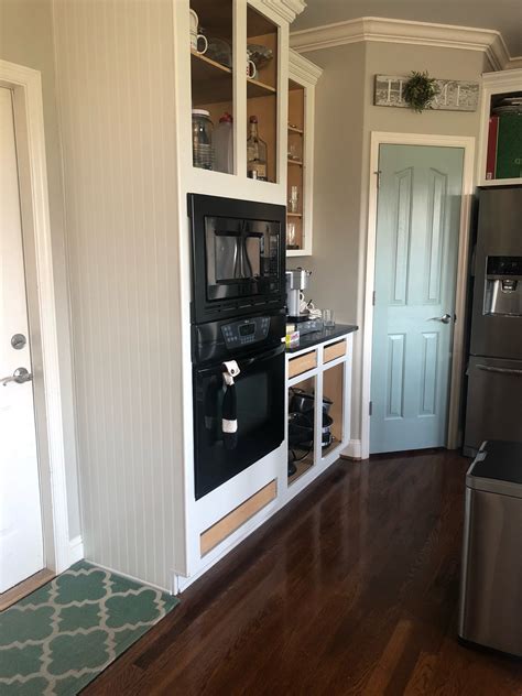 And, with the high cost of refacing or replacing faded, dated kitchen cabinets, painting them is a great option. My painted kitchen cabinet makeover...before, after and ...