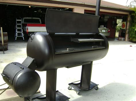 Surround yourself with good friends and great food. 120 Gallon Propane Tank | Smoker plans, Custom bbq smokers