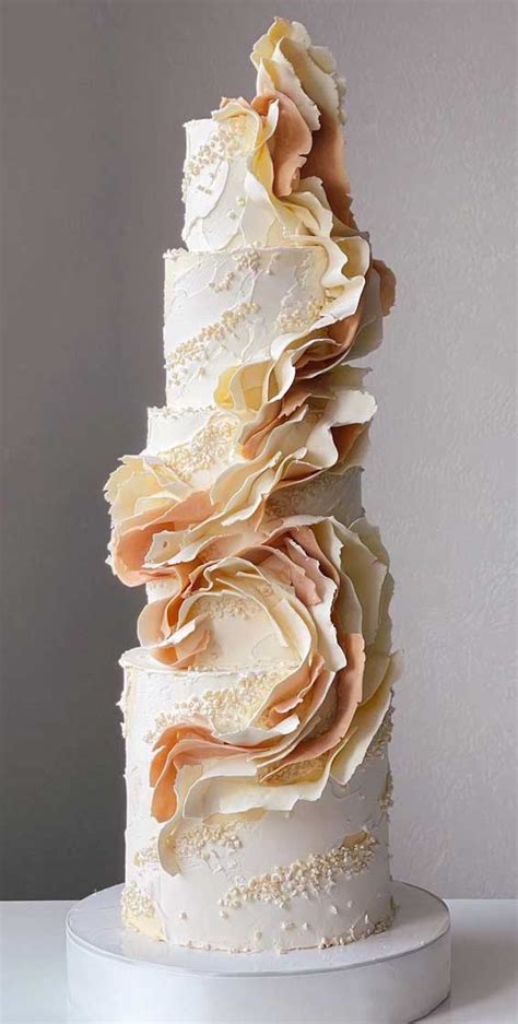 40 pretty and new wedding cake trends 2021 nude tone wedding cake with ruffle detailing