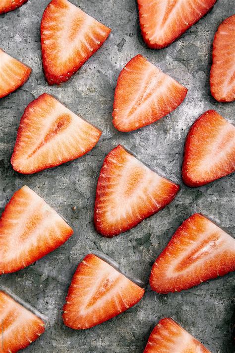 Sliced Strawberries By Stocksy Contributor James Ross Stocksy