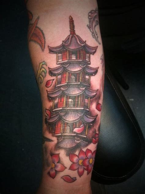 Nice Colored Forearm Tattoo Of Asian Temple With Flowers Tattooimagesbiz
