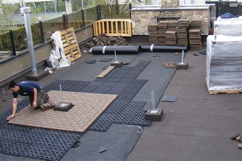 roofing pavers and each 2u0027x2u0027 paver is set on pedestals raising the entire paver surface