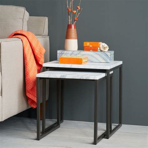 Nesting tables are not new, yet this nesting table from west elm has caught our eyes with its unique shape. Box Frame Nesting Tables - Marble | west elm UK