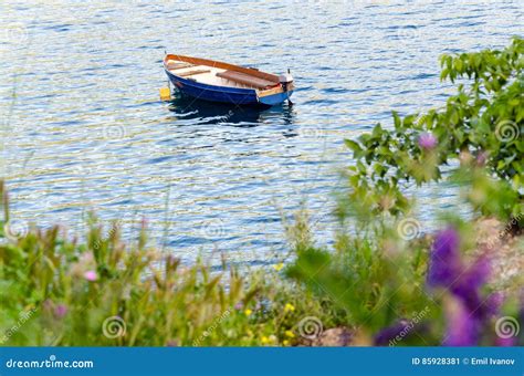 Blue Boat Moored In Lake Stock Image Image Of Framed 85928381