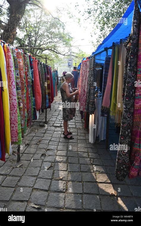 Street Market In Fort Kochi India European Tourist Looking At Silk